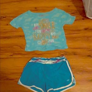 A justice crop top with sketcher active shorts
